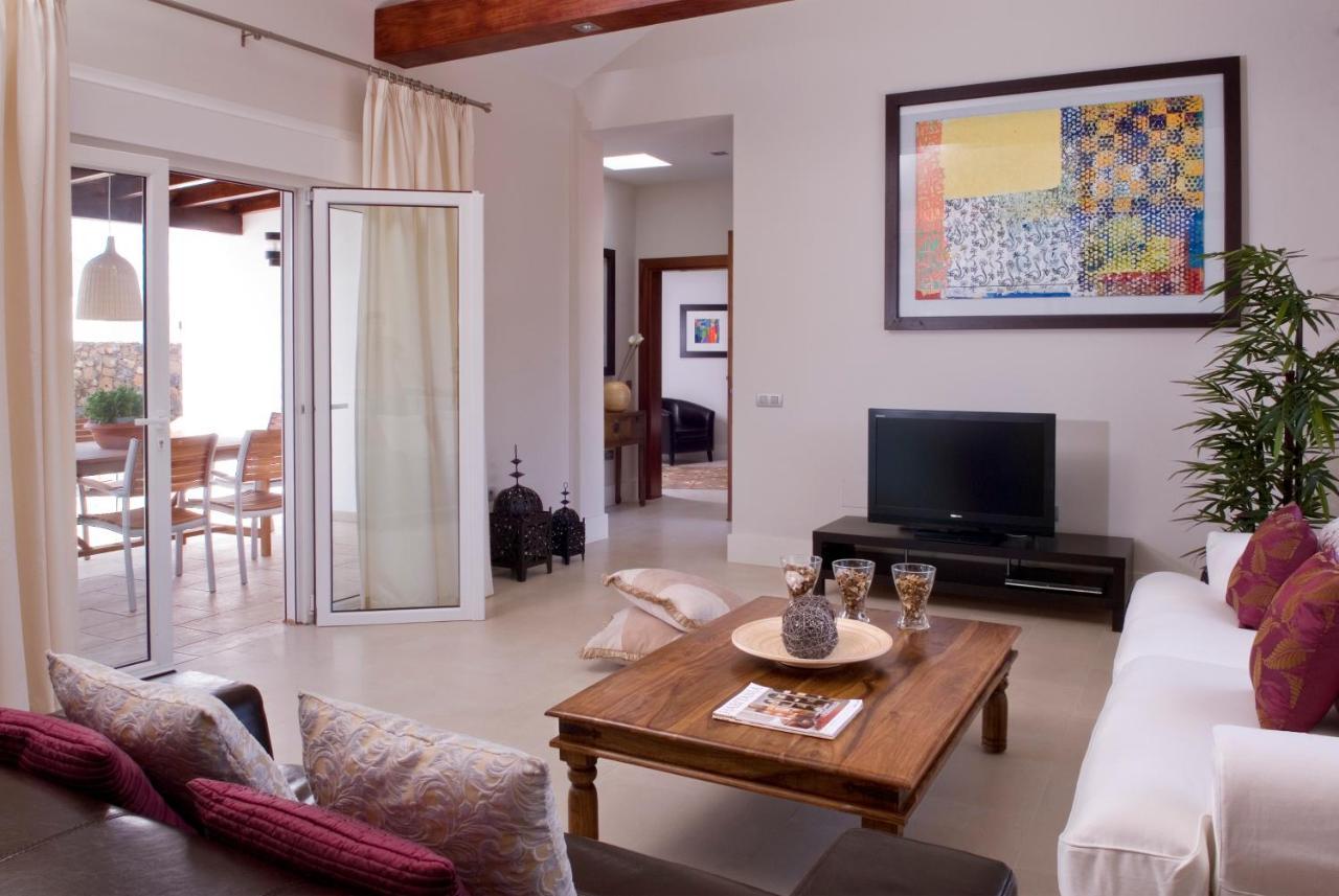 Coral Villas ปูแอร์โตเดลคาร์เมน ภายนอก รูปภาพ