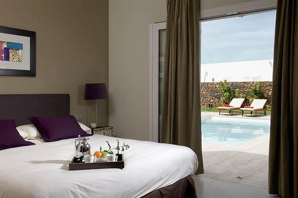 Coral Villas ปูแอร์โตเดลคาร์เมน ภายนอก รูปภาพ