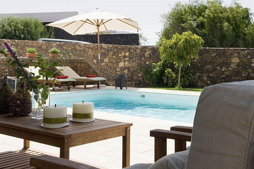 Coral Villas ปูแอร์โตเดลคาร์เมน ภายนอก รูปภาพ