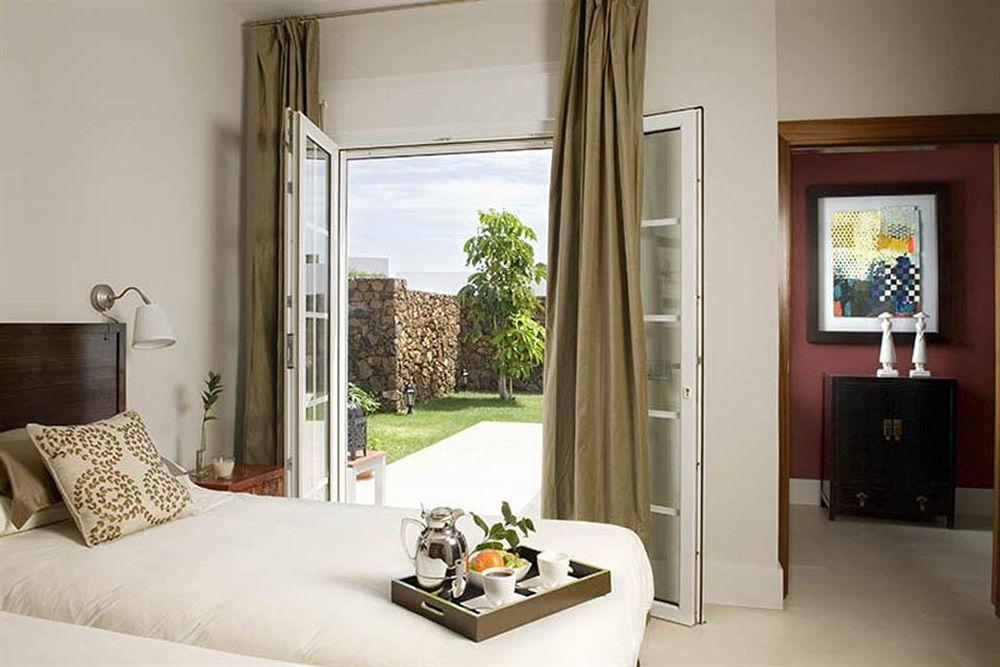 Coral Villas ปูแอร์โตเดลคาร์เมน ภายนอก รูปภาพ
