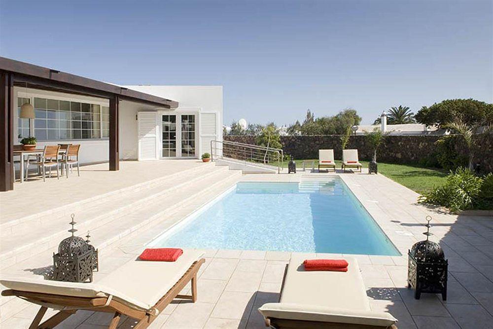 Coral Villas ปูแอร์โตเดลคาร์เมน ภายนอก รูปภาพ
