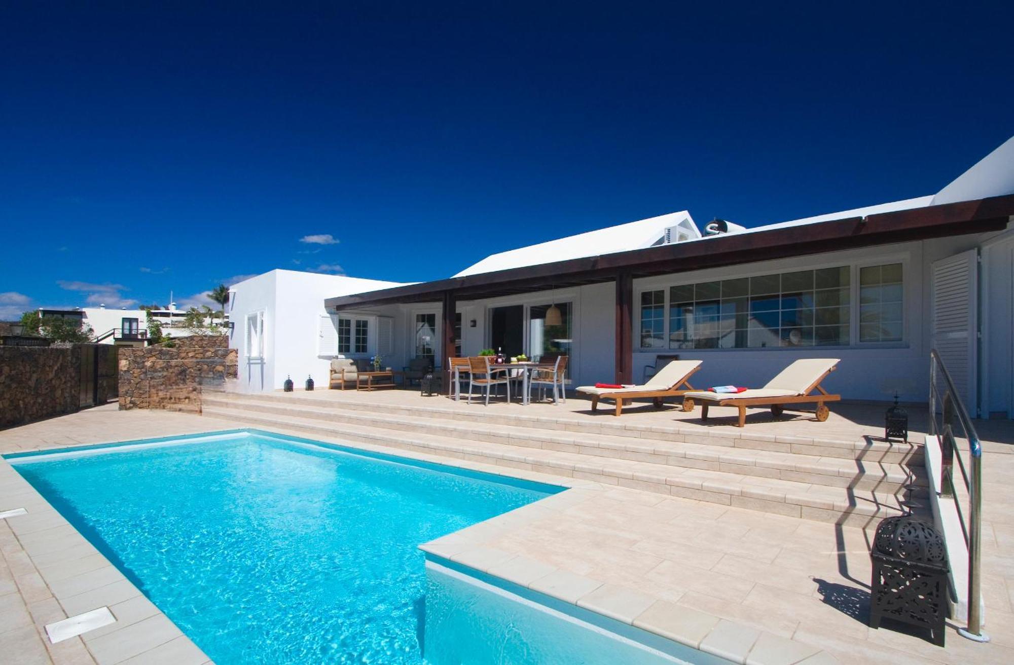 Coral Villas ปูแอร์โตเดลคาร์เมน ภายนอก รูปภาพ