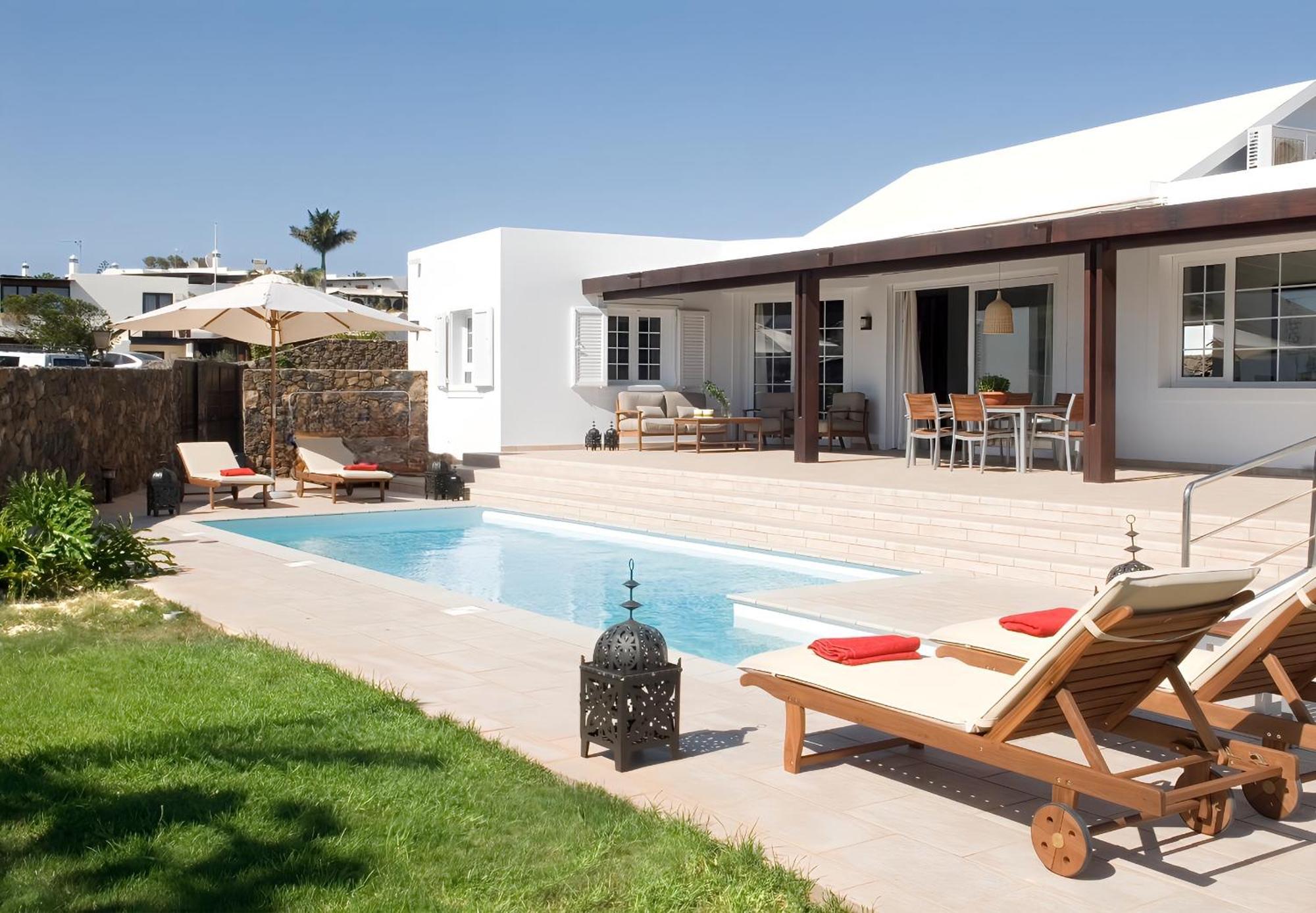 Coral Villas ปูแอร์โตเดลคาร์เมน ภายนอก รูปภาพ
