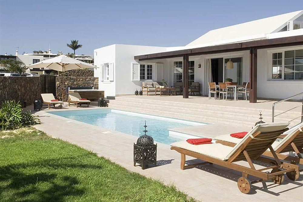 Coral Villas ปูแอร์โตเดลคาร์เมน ภายนอก รูปภาพ