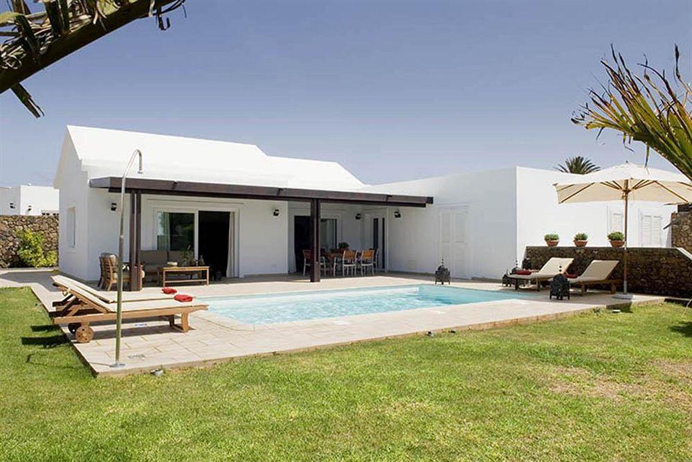 Coral Villas ปูแอร์โตเดลคาร์เมน ภายนอก รูปภาพ