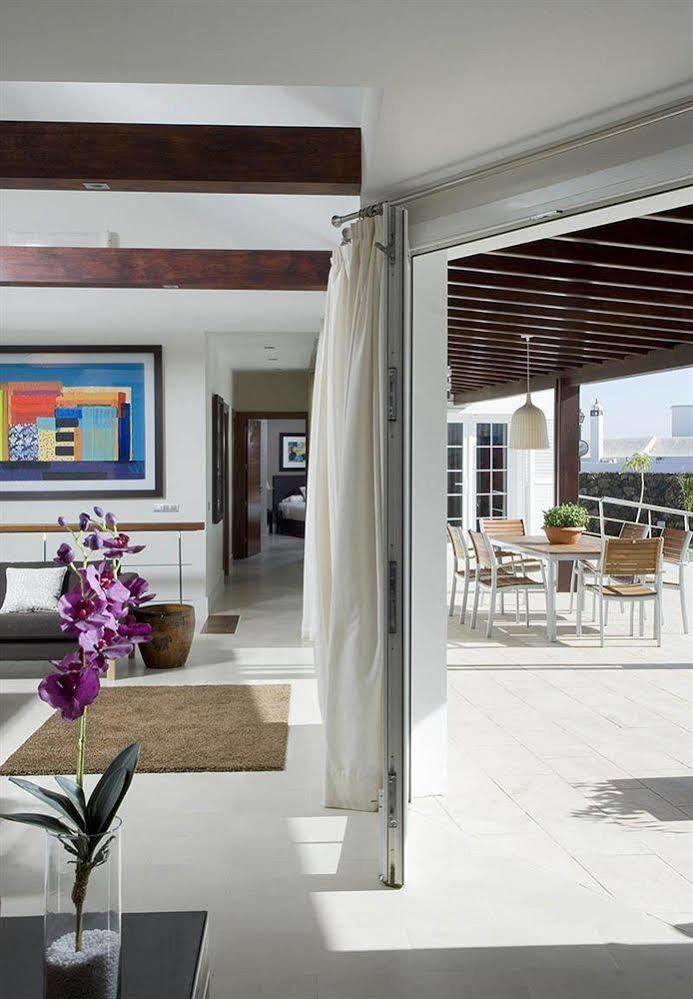 Coral Villas ปูแอร์โตเดลคาร์เมน ภายนอก รูปภาพ